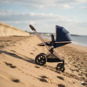 The Cybex Priam in two-wheel mode, demonstrating how to navigate UK kerbs and sandy terrain easily.