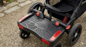 Top view of a buggy board featuring a wide non-slip surface and reflectors for safety.