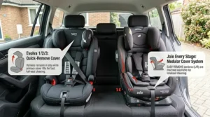 Showing the machine-washable fabric covers being removed from a Britax Evolva car seat for easy cleaning.