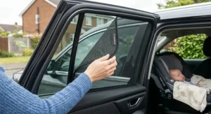 Close-up detail of high-quality breathable mesh material on a car window sunshade for baby, ensuring airflow.