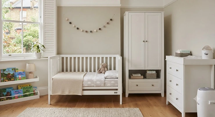 Matching white cot bed and wardrobe nursery furniture set. cot bed and wardrobe set