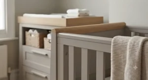 A focus on the rounded corners and secure fixings of a traditional nursery furniture set, meeting UK safety standards.