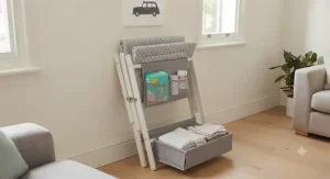 A portable and lightweight changing table under £50 folded neatly against a wall in a living room.