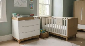 Detailed shot of a gentle push-to-close drawer runner on a nursery changing unit designed for quiet, trap-free operation.