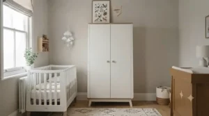 Modern double baby wardrobe with a spacious lower drawer used for storing extra bedding, muslins, and blankets.